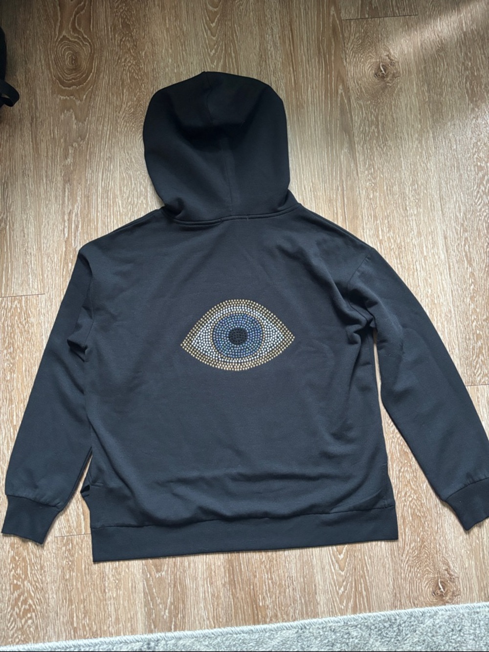Brit.ny black hoodie sweatshirt with rhinestone eye, medium